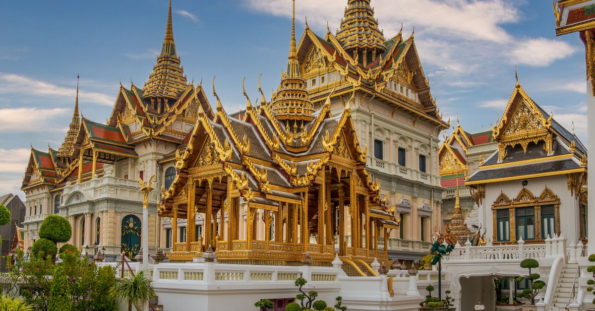 Captivating view of ornate golden temples at Bangkok's Grand Palace, Thailand.