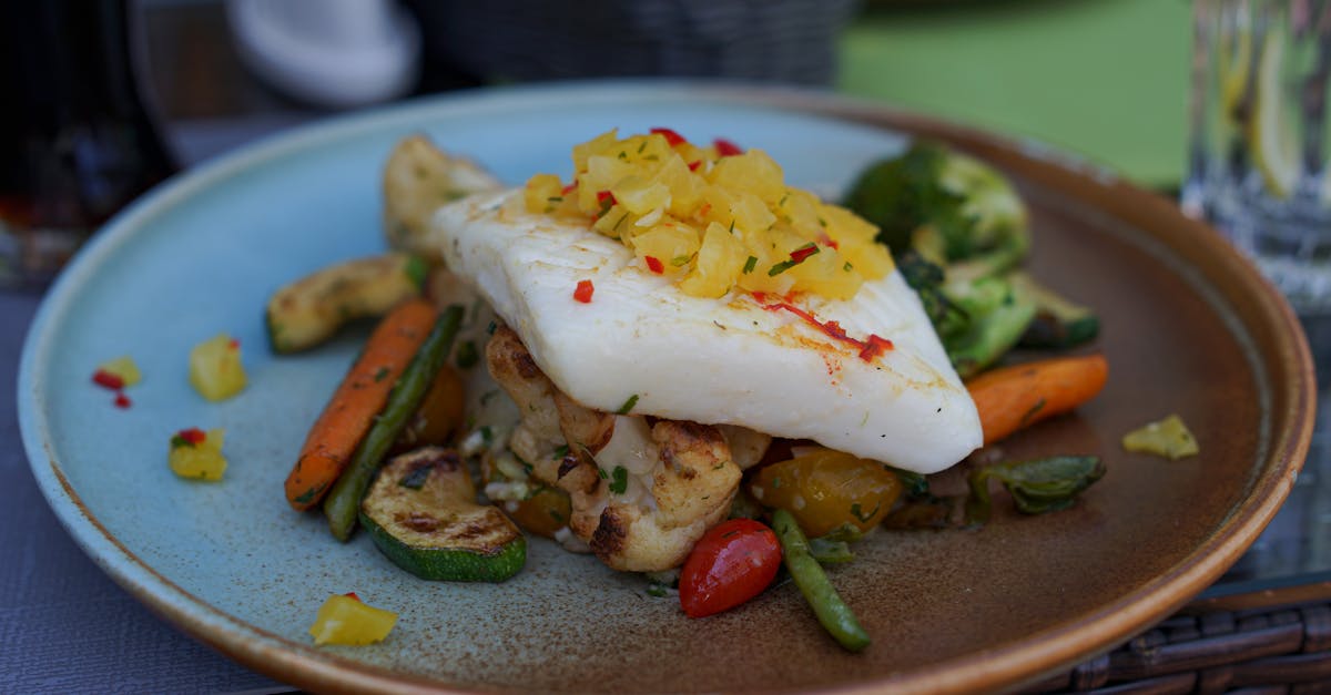 A mouth-watering plate of grilled fish served with fresh vegetables from a Gdynia restaurant.