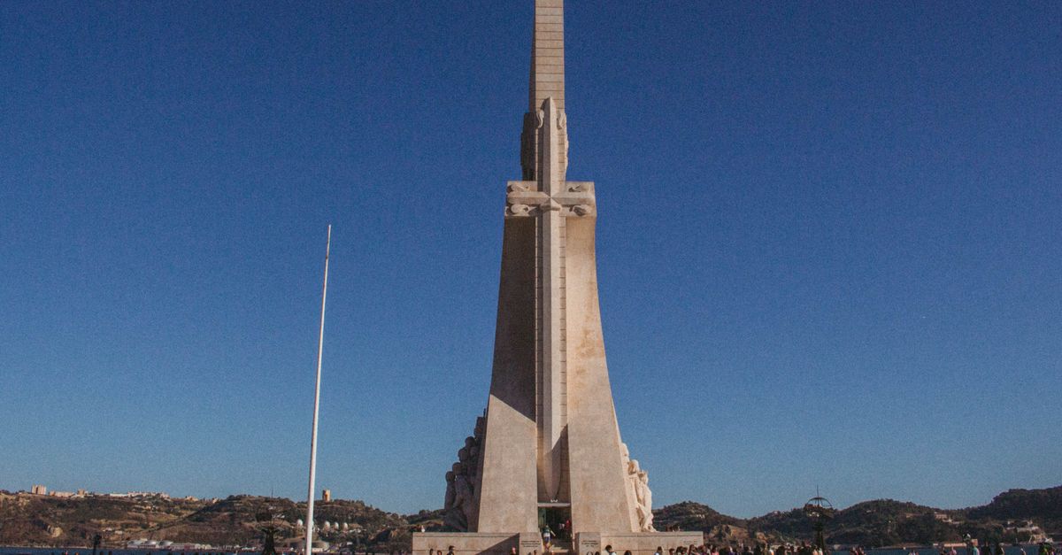 Iconic view of the Padrão dos Descobrimentos monument in Lisbon, Portugal on a sunny day.