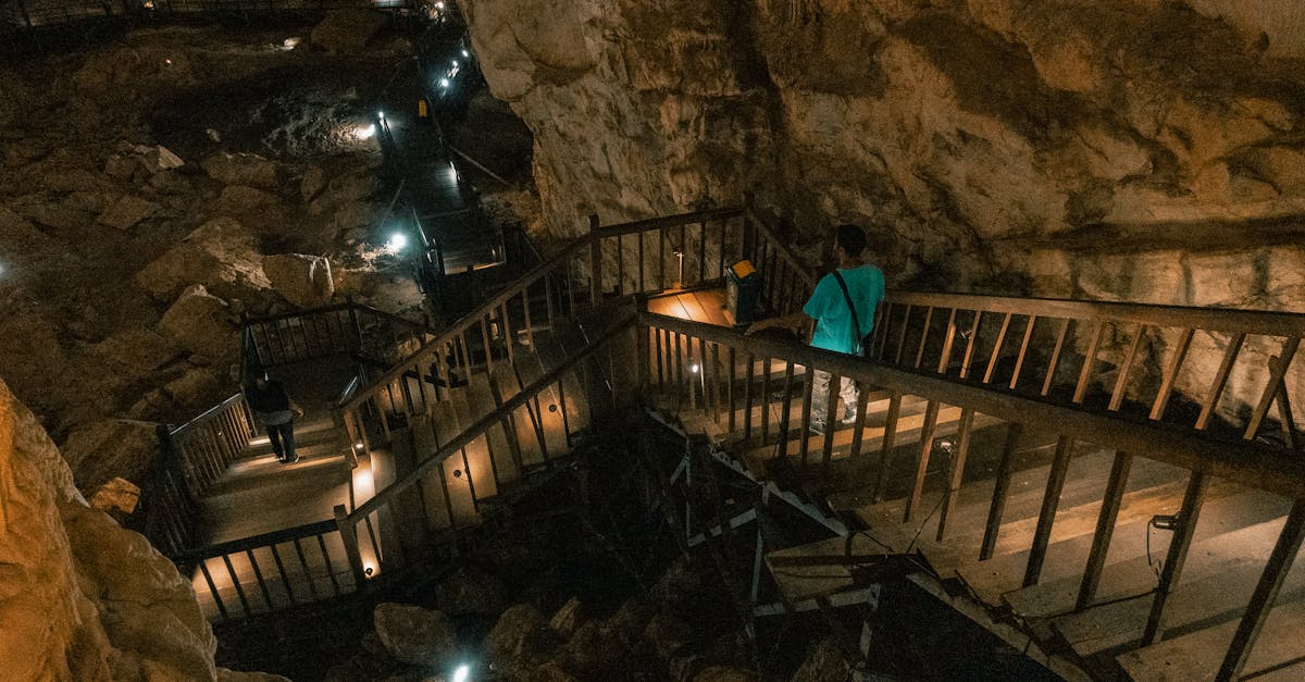 Discover the enthralling beauty of Paradise Cave with illuminated stairs and rocky interiors.