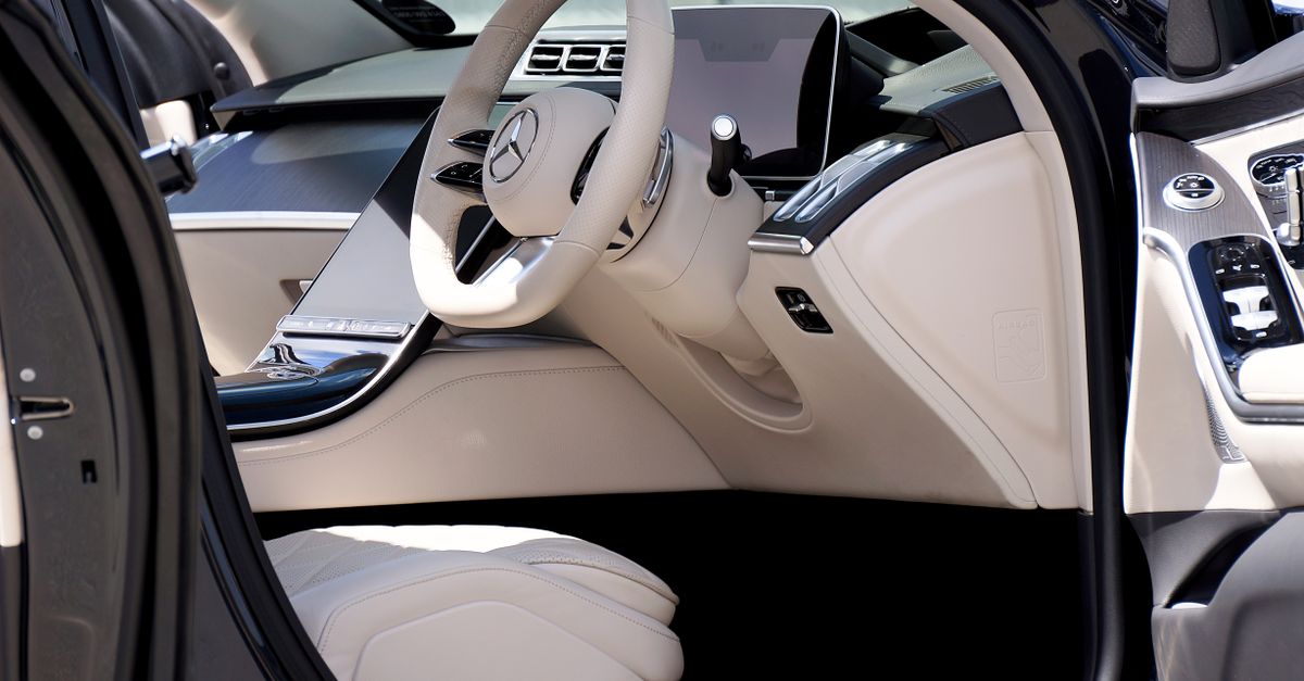 Explore the luxurious and modern design of a premium car interior focusing on elegant details.