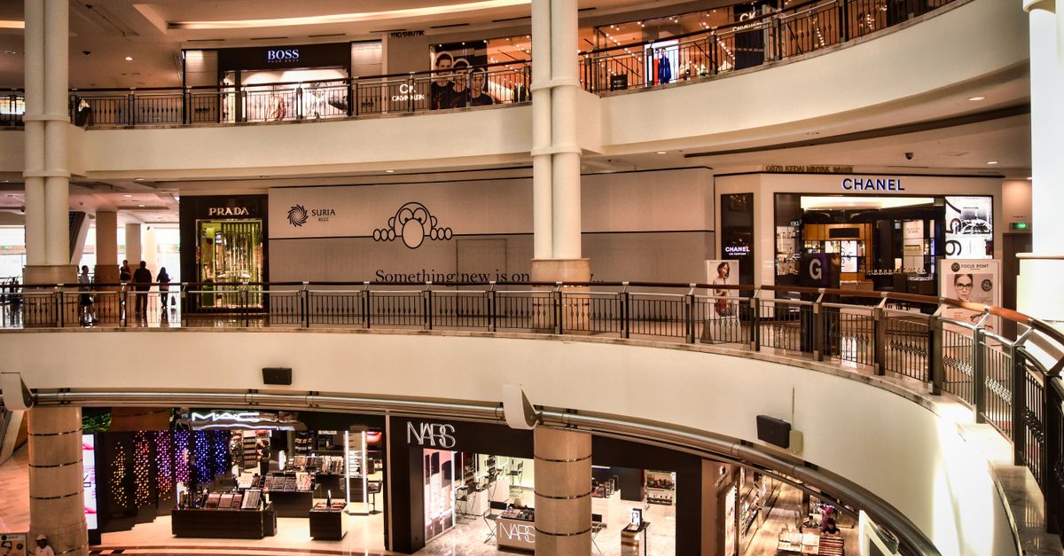 Explore the luxurious interior of a shopping mall in Kuala Lumpur, Malaysia, featuring top brands.