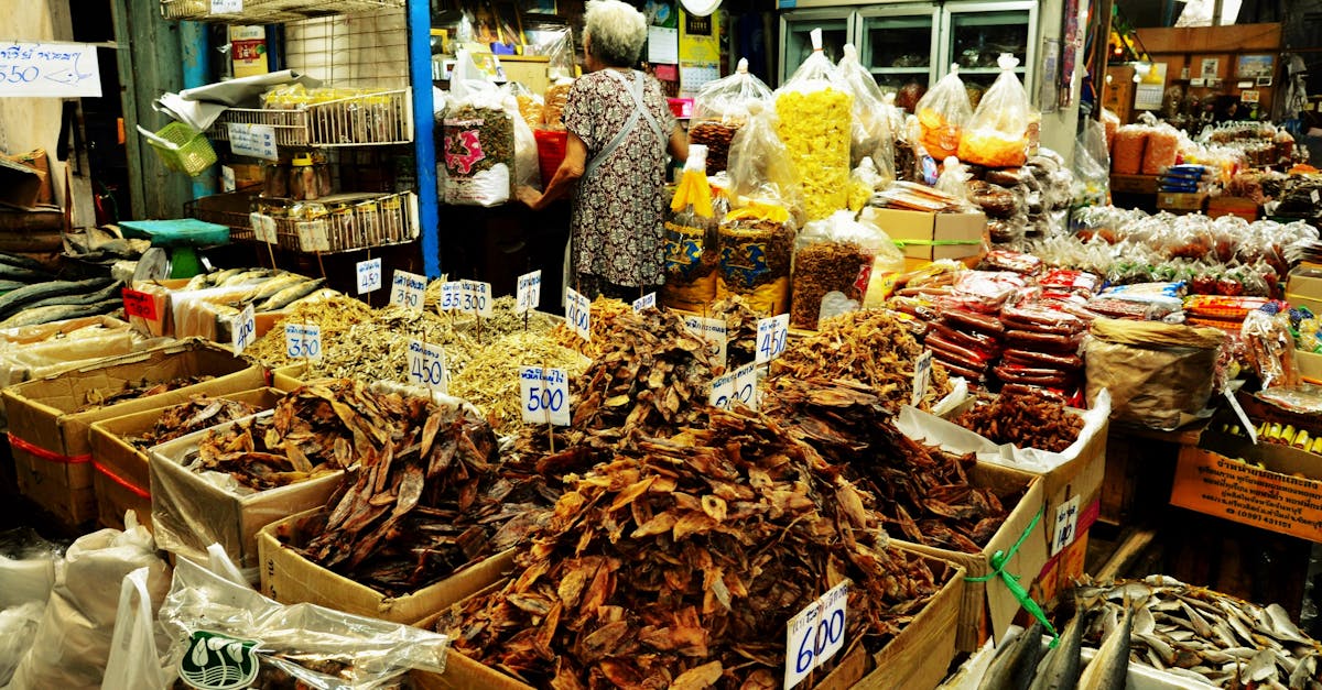 A vibrant display of dried goods and produce in a Bangkok market. Perfect for travel and culture themes.