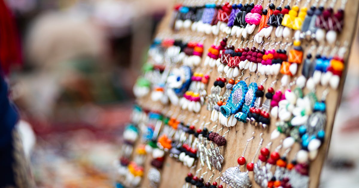 Vibrant handmade jewelry on display at a lively Indian market.