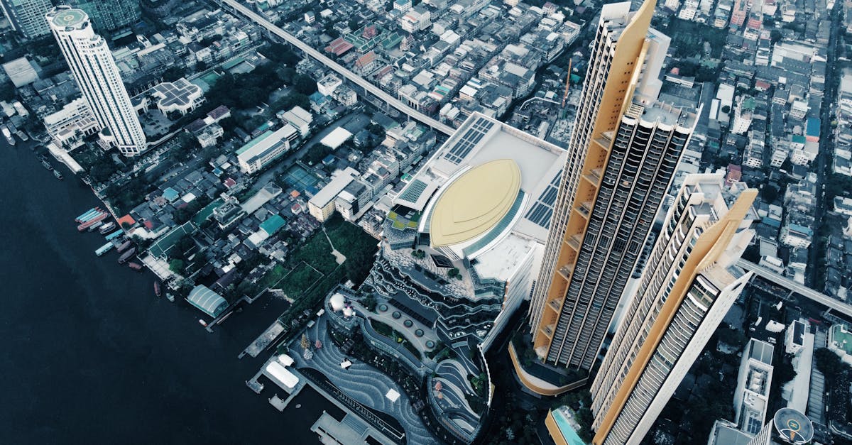 Stunning aerial shot of Bangkok's cityscape along the Chao Phraya River.
