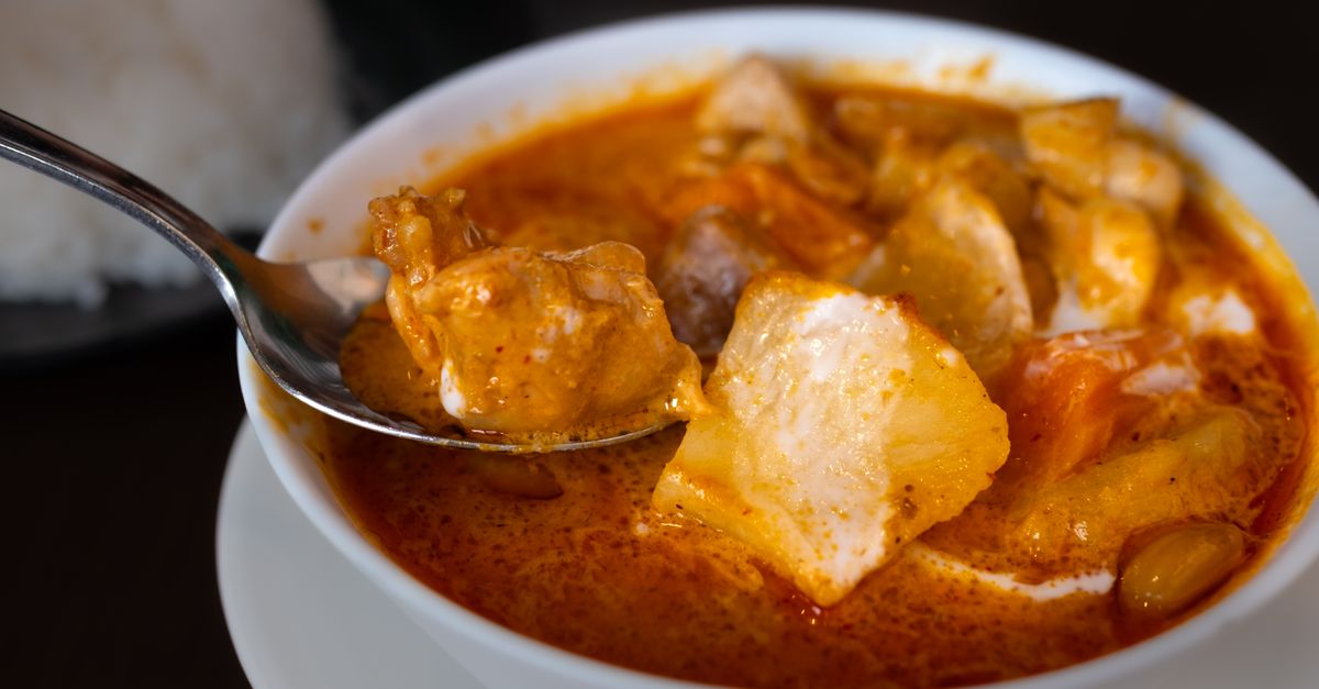 Japanese curry with tender chicken and potatoes in a rich, spicy sauce.