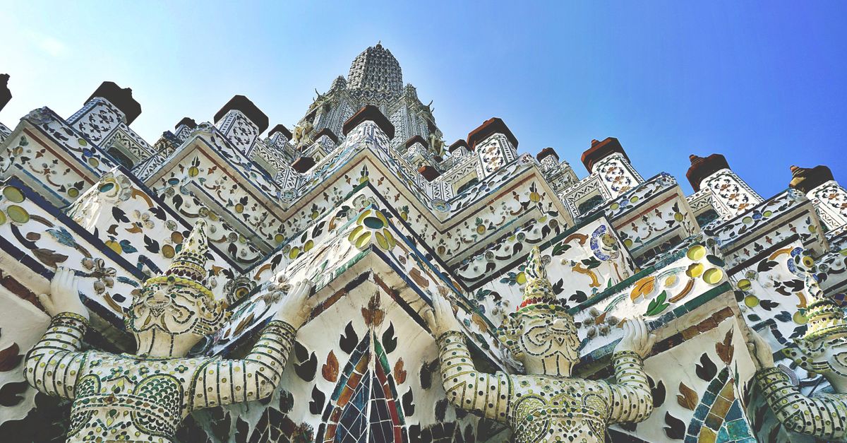 Close-up of the intricate mosaics at Wat Arun temple, Bangkok, Thailand.