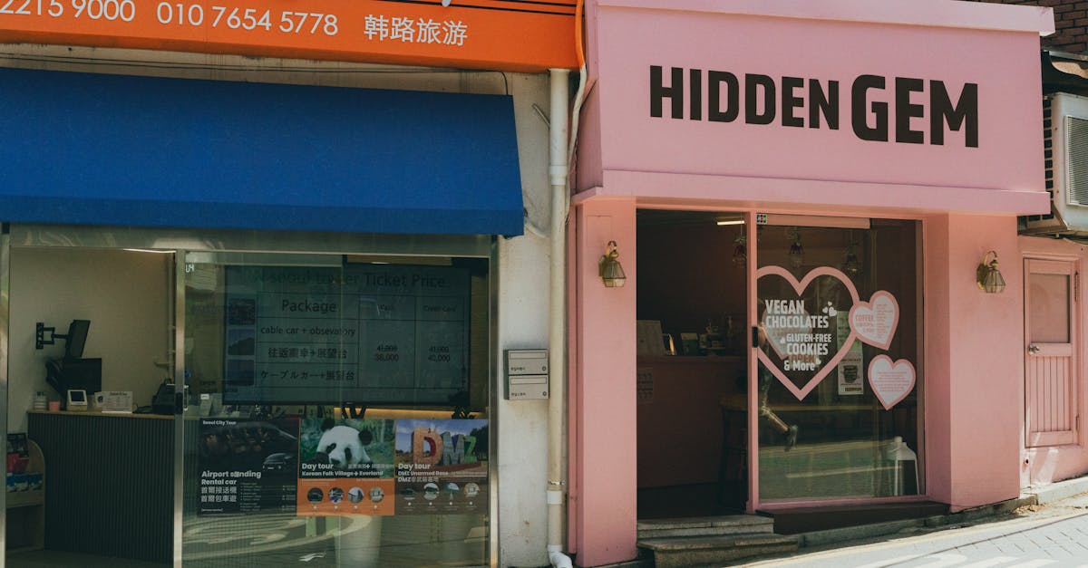 Explore the vibrant street shops of Seoul, featuring a travel agency and 'Hidden Gem' bakery.