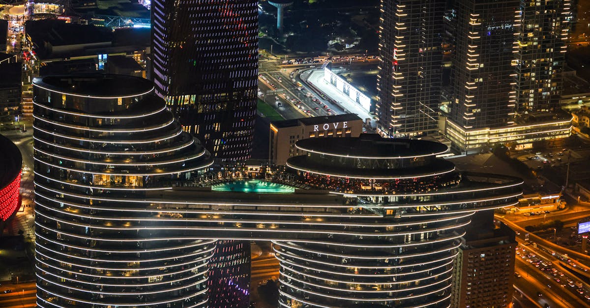 A breathtaking aerial view of a vibrant city skyline illuminated at night.