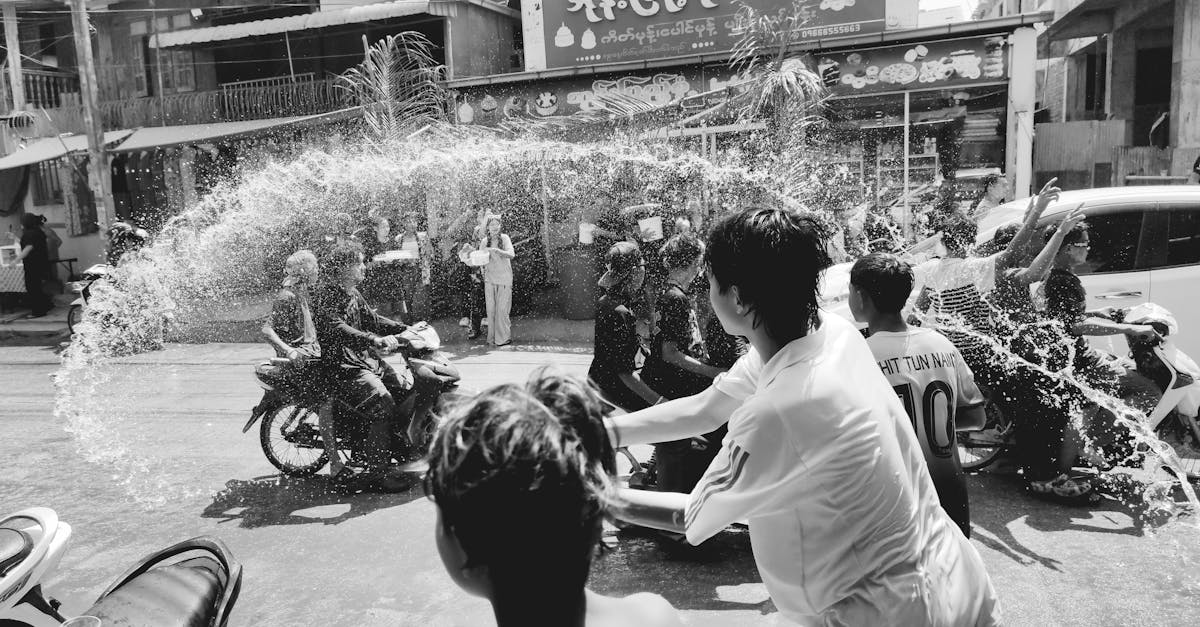 Energetic water fight during a traditional festival in Myawaddy, Myanmar, capturing lively cultural festivities.