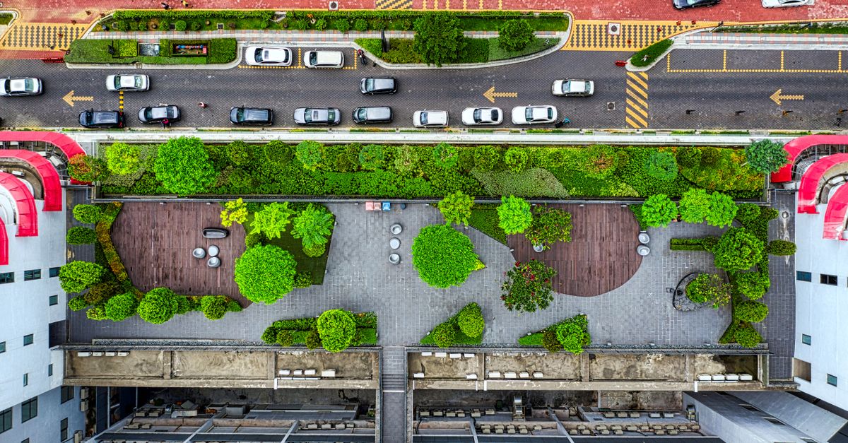 Aerial view of a lush green rooftop garden in Petaling Jaya, Malaysia. Urban architecture meets nature.