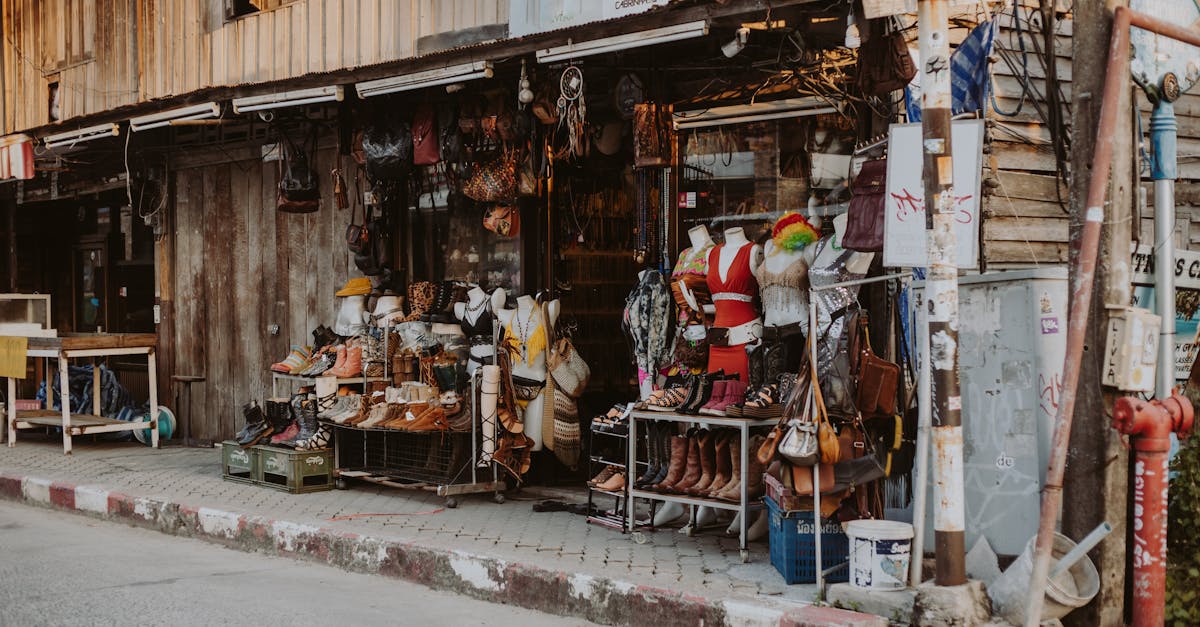Charming outdoor street market showcasing assorted rustic apparel and accessories.