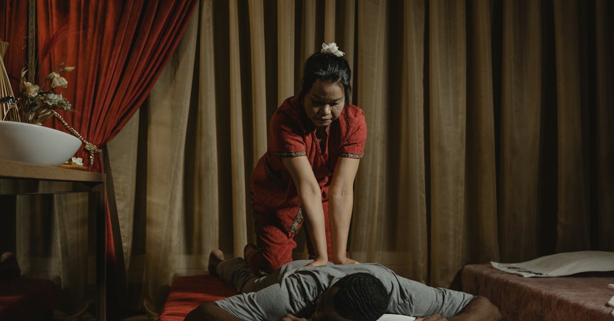 A calming massage therapy session in a spa setting with a focus on relaxation and wellness.