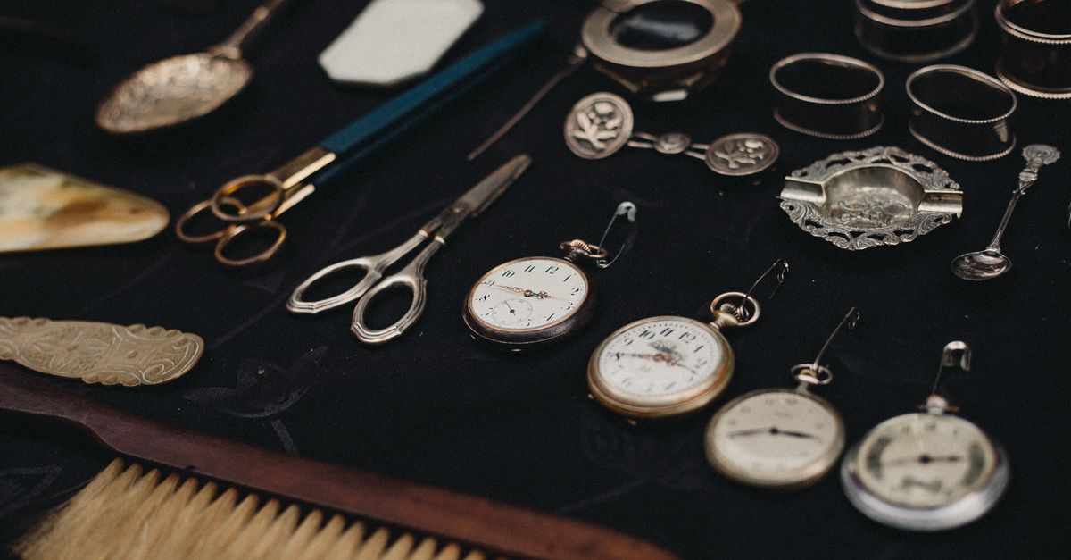 A selection of vintage pocket watches and antiques on display, embodying retro elegance.